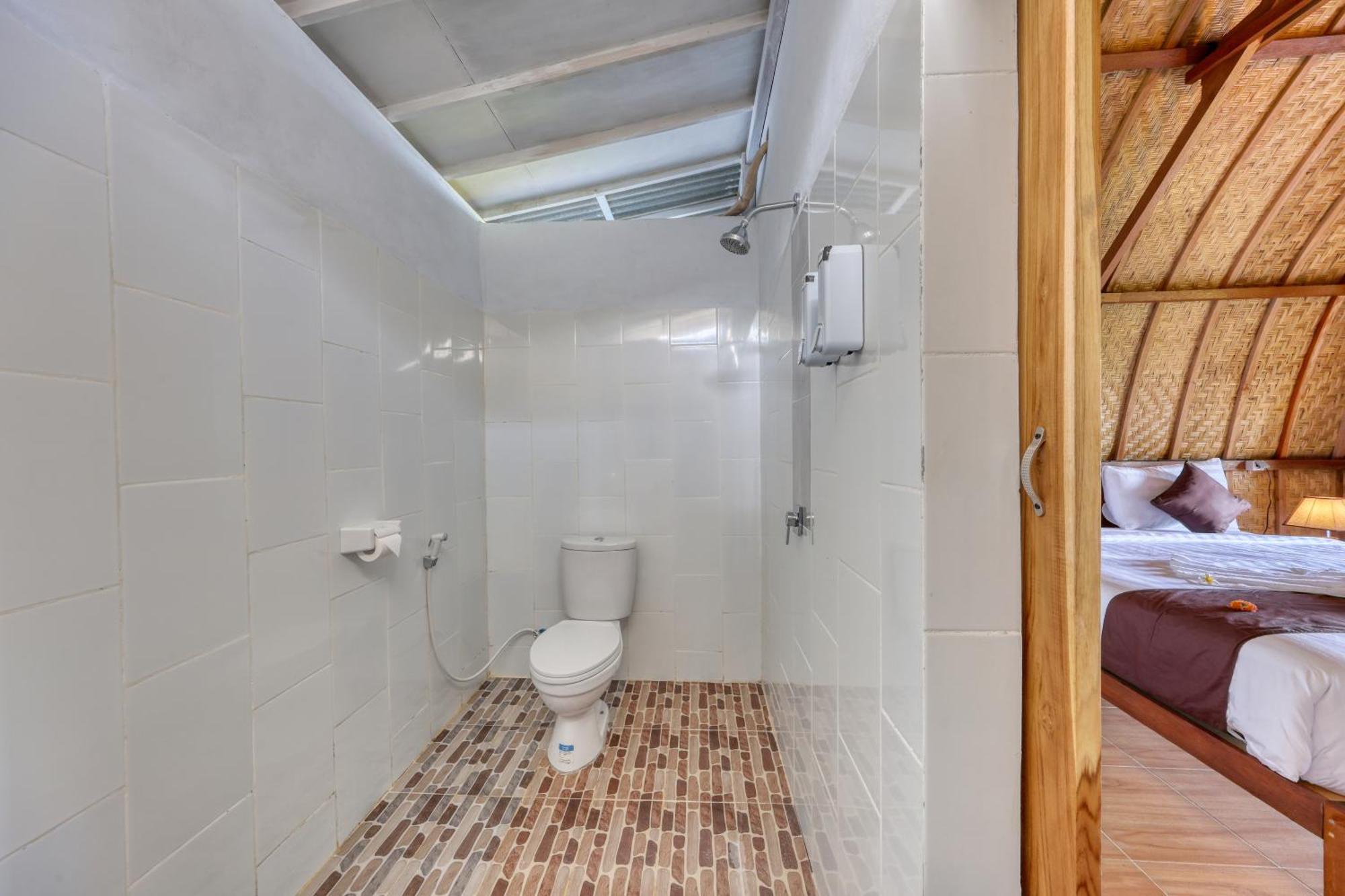 D Sebuluh Bungalow Batumadeg 部屋 写真